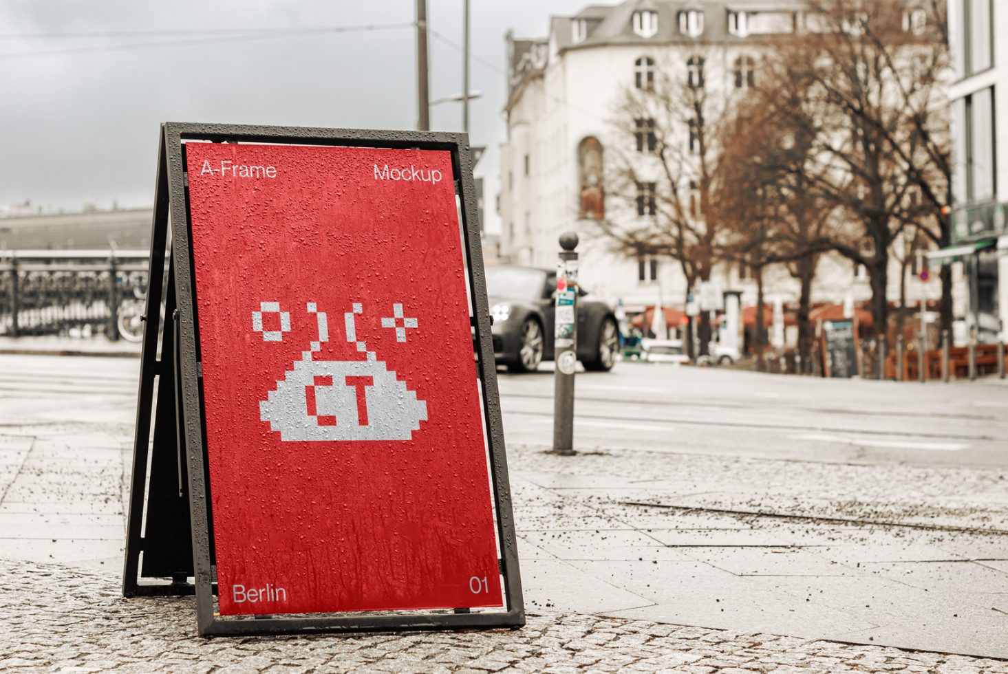 Red A-Frame signboard mockup with pixel art design on a rainy city street, showcasing mock-up potential for urban outdoor advertisement.